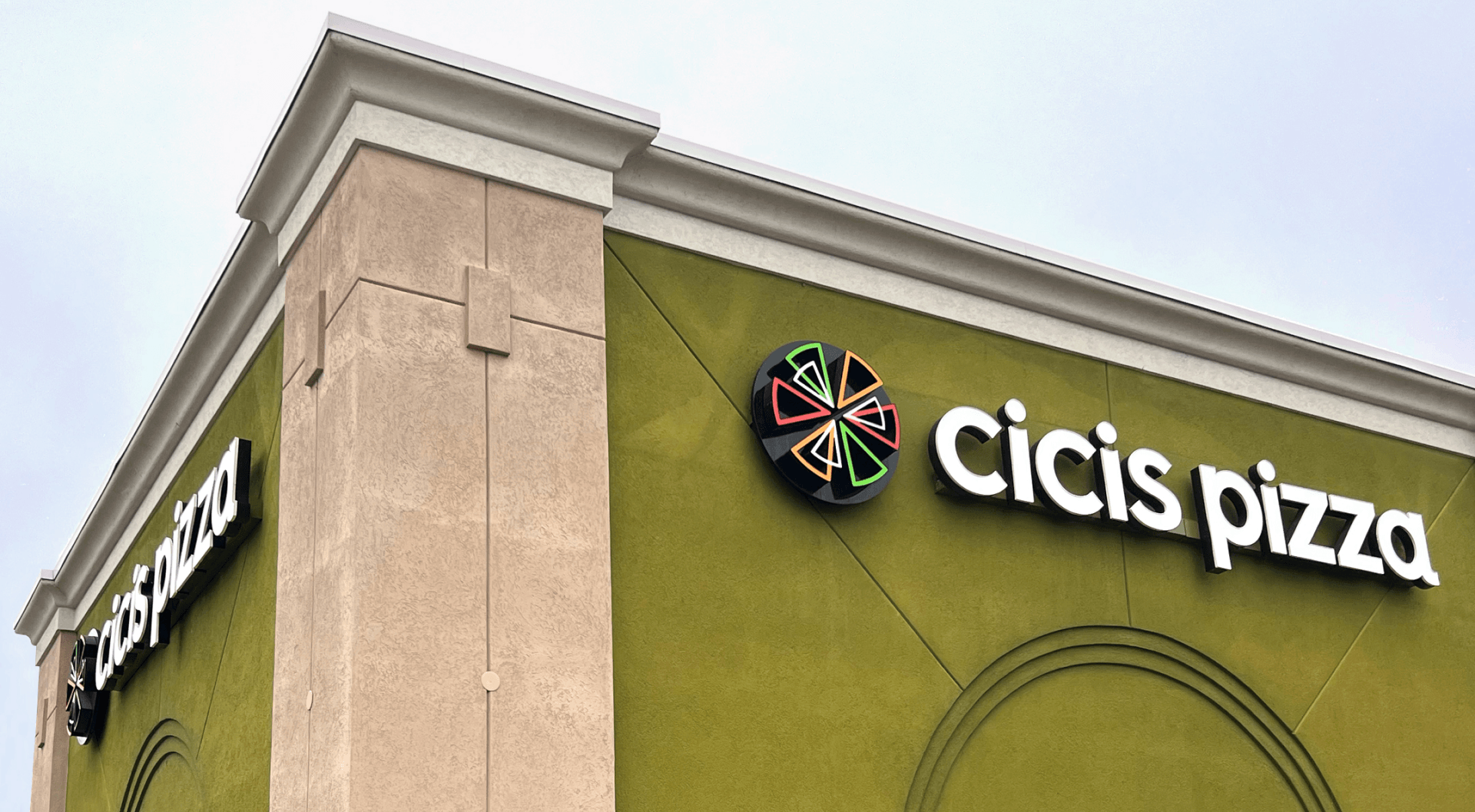 Cicis Pizza logo on a building