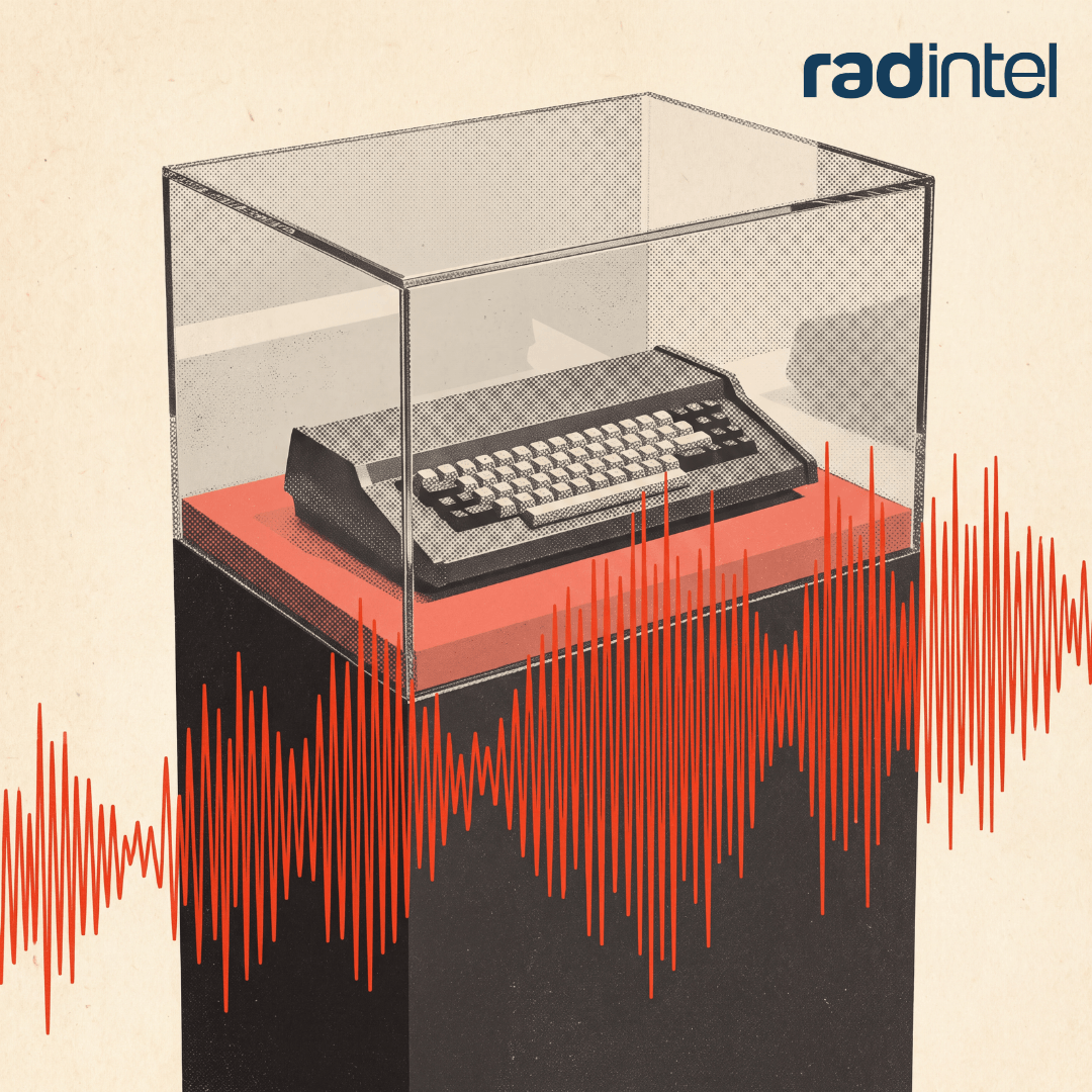 A keyboard in a display case, with voice waves layered over top, showing that AI voice dictation may be the way of the future.