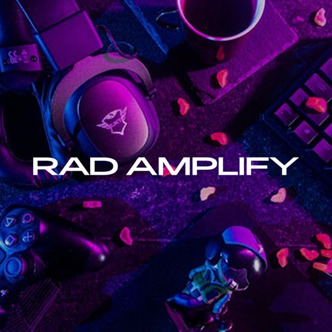 The Rad Amplify logo over gaming equipment