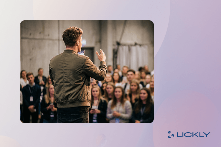 Creator talking to a crowded audience.