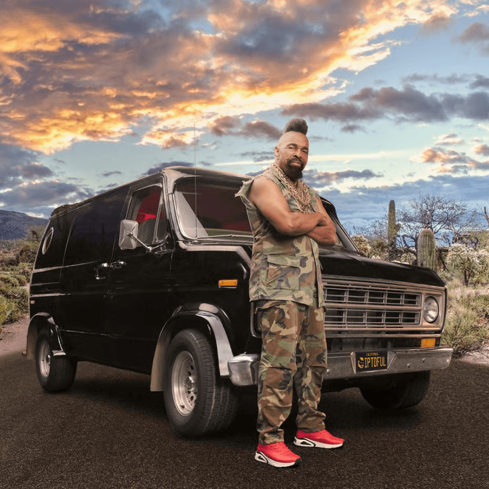 Mr T. standing in front of a van wearing Skechers shoes